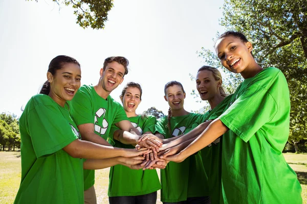 Environmental activists putting hands together — Stock Photo, Image