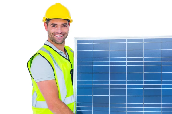 Lächelnder Handwerker mit Solarpaneel — Stockfoto