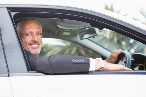 Handsome businessman looking at camera — Stock Photo, Image