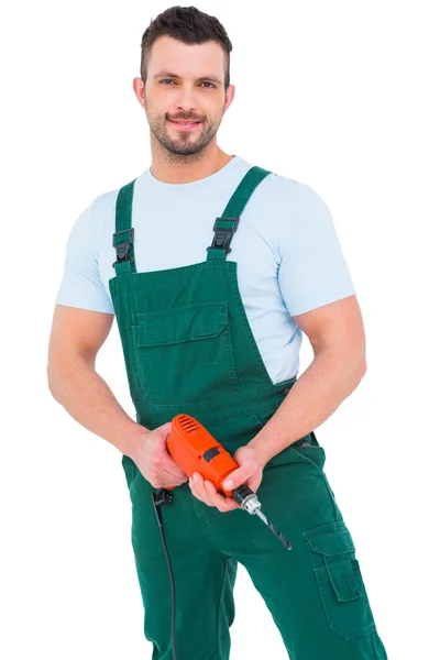 Handyman holding power drill — Stock Photo, Image