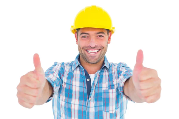 Worker gesturing thumbs up Stock Image