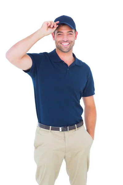 Felice uomo di consegna indossando cappello — Foto Stock