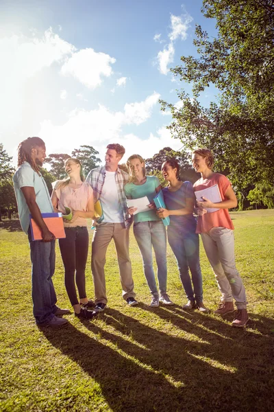 Happy students outside on campus — Stock Photo, Image