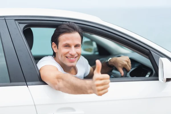 Man smiling and showing thumbs up — Stock Photo, Image