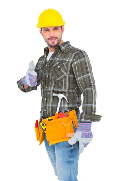 Confident manual worker gesturing thumb up — Stock Photo, Image