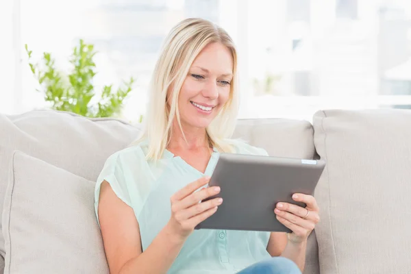 Woman using digital tablet at home — Stock Photo, Image