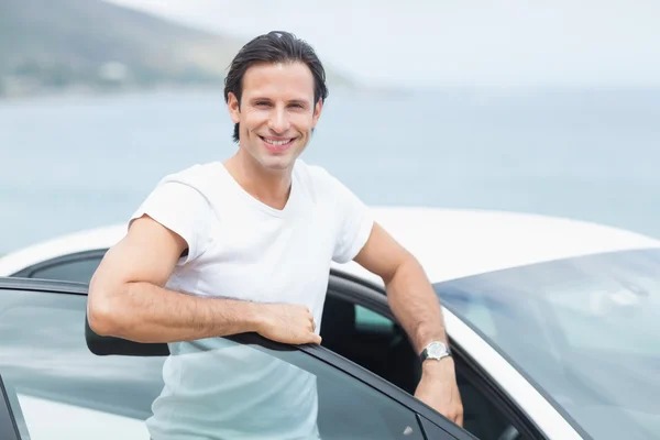 Man leaning on the door — Stock Photo, Image