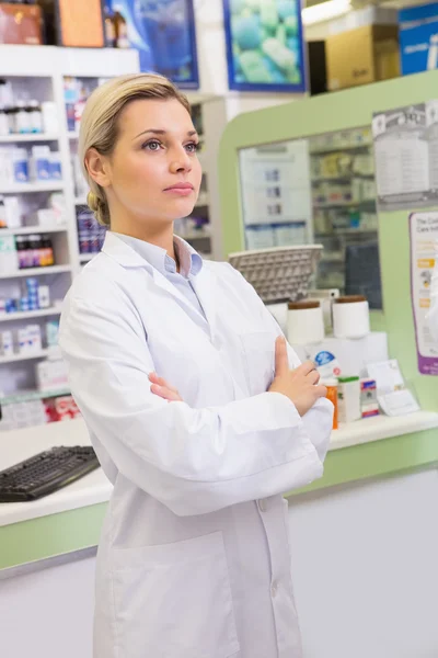 Junior pharmacist with arms crossed — Stock Photo, Image