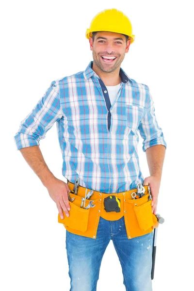 Handyman standing with hands on hips — Stock Photo, Image