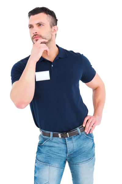 Tecnico con mano sul mento alzando lo sguardo — Foto Stock