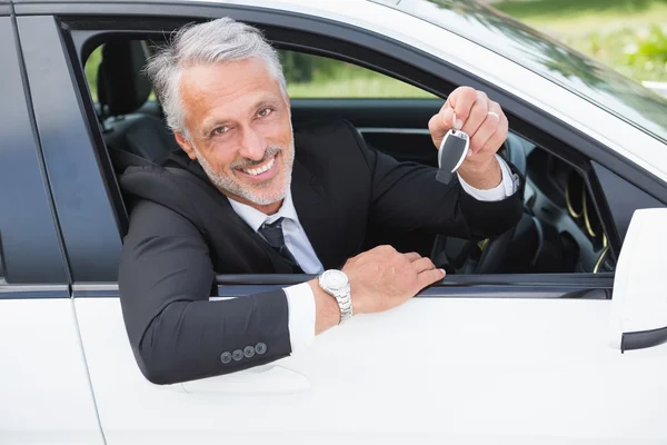 Empresário sentado no lugar dos motoristas — Fotografia de Stock