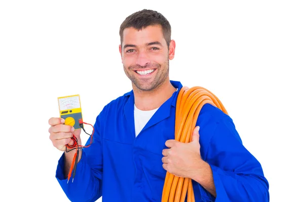 Eletricista com fio laminado e multímetro — Fotografia de Stock