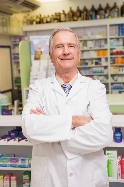 Senior pharmacist with arms crossed — Stock Photo, Image