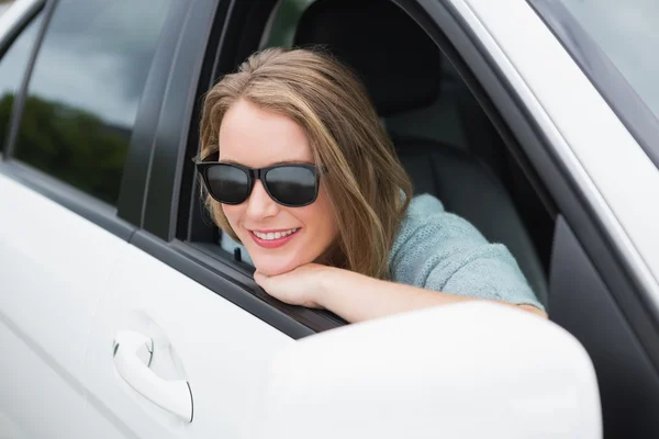 Happy woman in the drivers seat — Stock Photo, Image