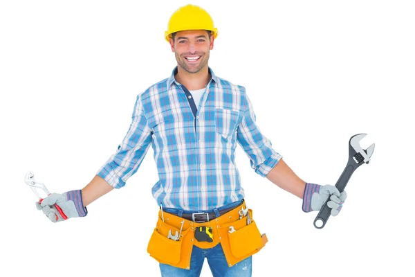 Handyman holding hand tools — Stock Photo, Image