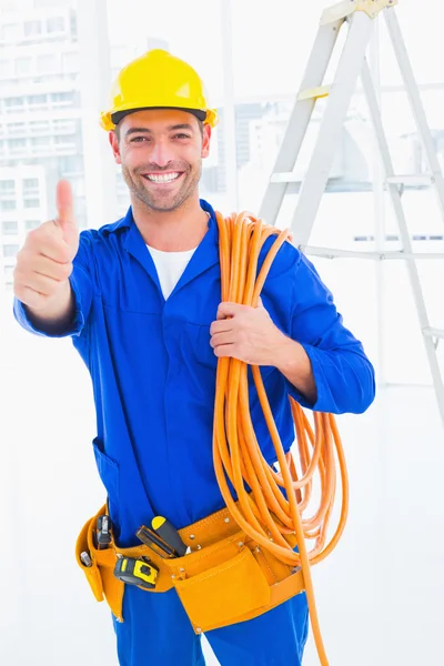 Male technician with wire roll — Stock Photo, Image