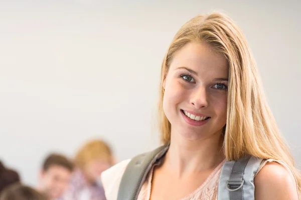 Close up portrait of smiling female student — Stock Photo, Image
