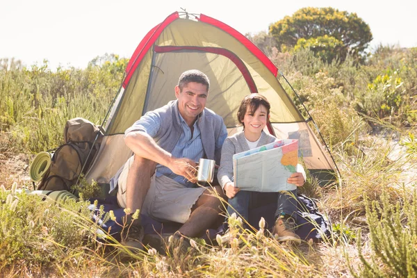 Father and son in their tent — Stock Photo, Image