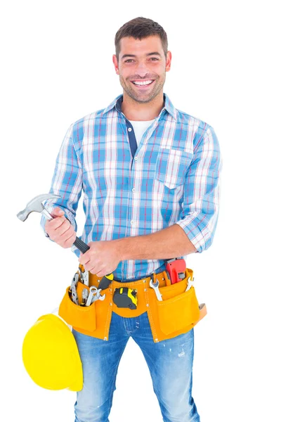 Уверенный ремонтник держит молоток — стоковое фото