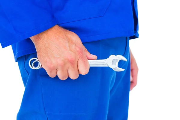 Mechanic holding spanners — Stock Photo, Image