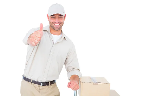 Delivery man gesturing thumbs up — Stock Photo, Image