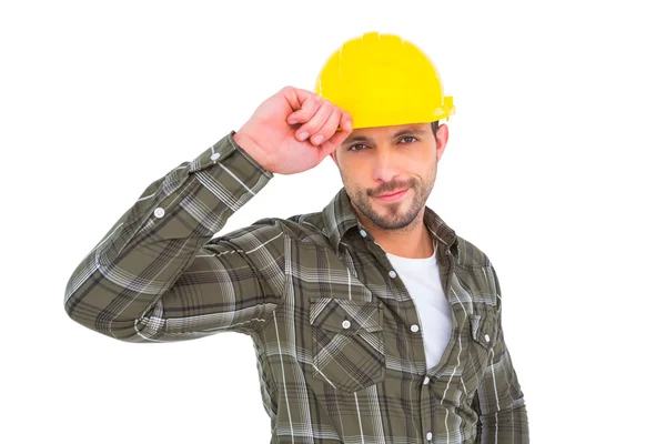 Smiling Handyman holding helmet — Stock Photo, Image