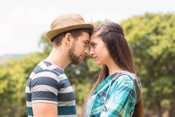 Young couple smiling at each other — Stock Photo, Image