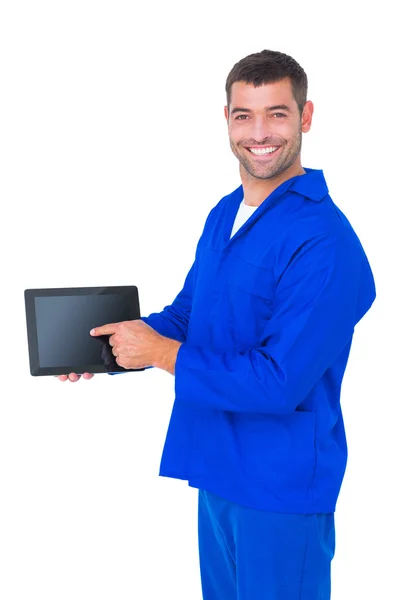 Mechanic pointing on digital tablet — Stock Photo, Image