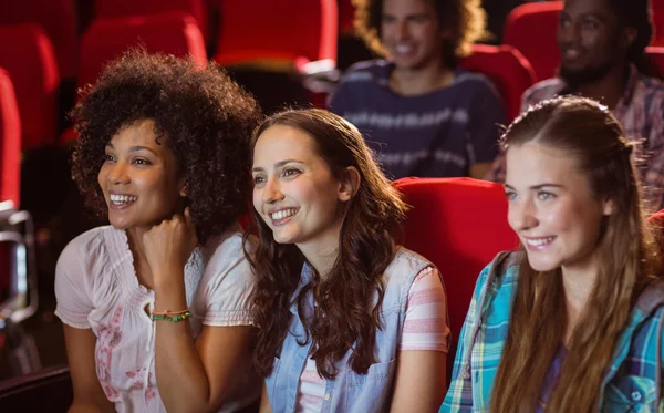 Young friends watching a film — Stock Photo, Image