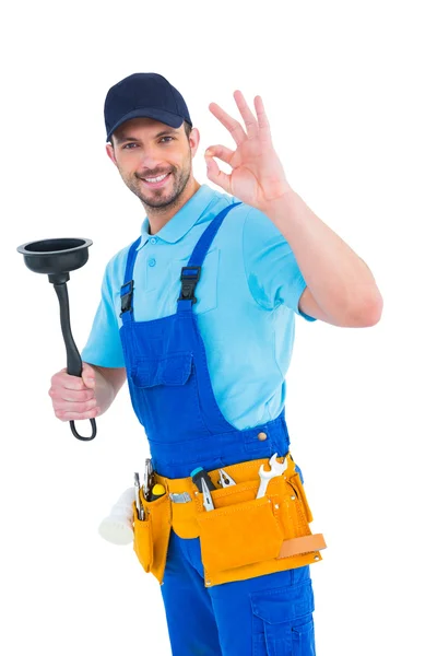 Plumber with plunger gesturing okay — Stock Photo, Image