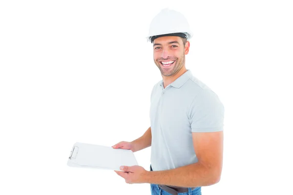 Manual worker holding clipboard — Stock Photo, Image