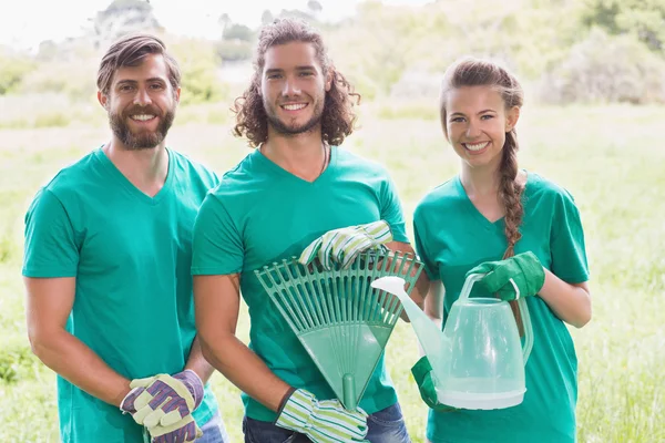 Happy friends gardening for the community — Stock Photo, Image