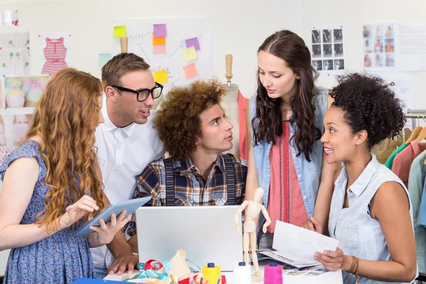 Designers using laptop and digital tablet — Stock Photo, Image