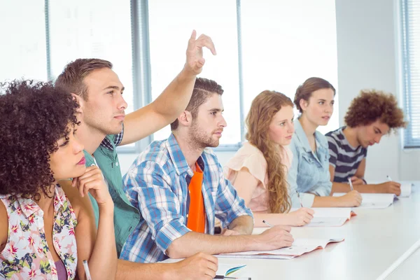 Fashion students being attentive in class — Stock Photo, Image