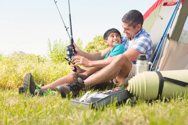 Father and son beside tent — Stock Photo, Image