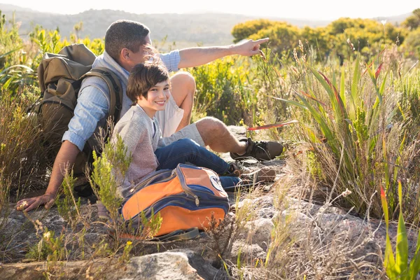 Father and son hiking in the mountains — Stock Photo, Image