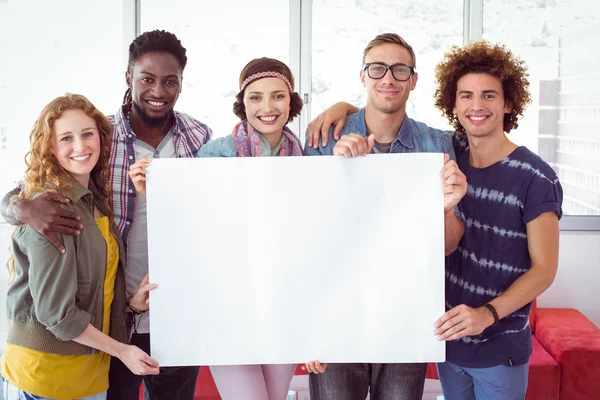 Fashion students smiling at camera together — Stock Photo, Image