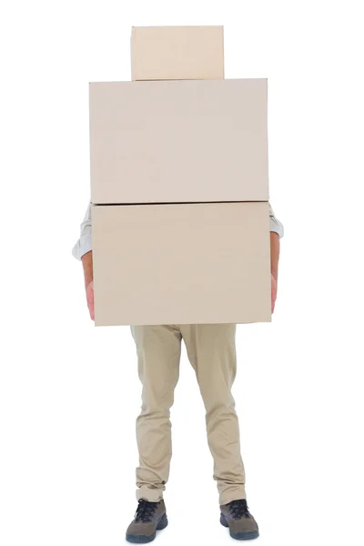 Courier man carrying cardboard boxes — Stock Photo, Image