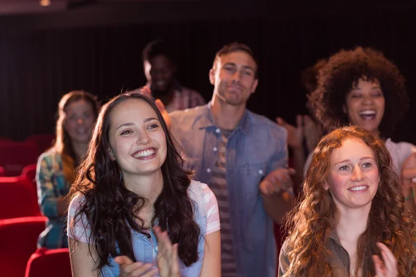 Young friends watching a film — Stock Photo, Image