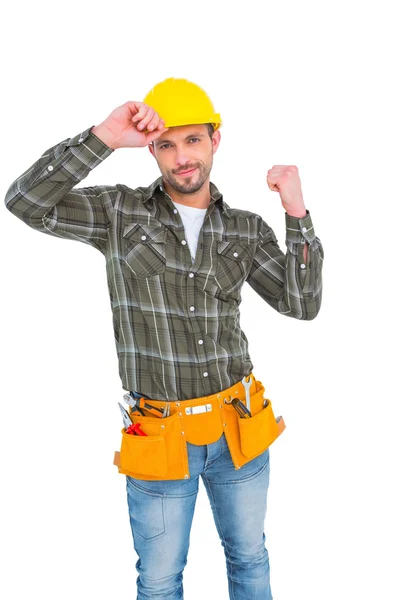 Uśmiechający się robotnik zaciskając pięści — Zdjęcie stockowe