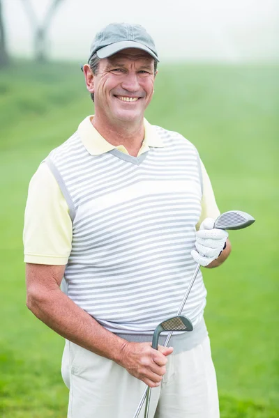 Glada golfare ler mot kameran — Stockfoto
