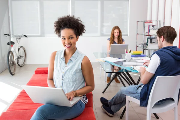 Creative team using laptops — Stock Photo, Image