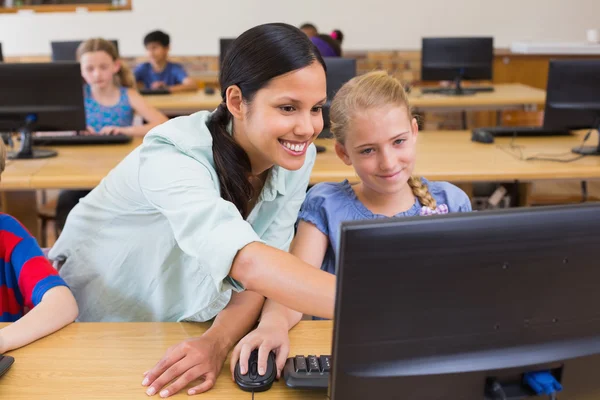 Cute pupils in computer class with teacher — Stock Photo, Image