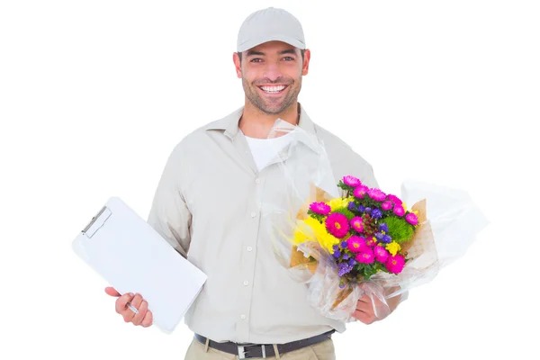 Livraison de fleurs homme tenant presse-papiers — Photo