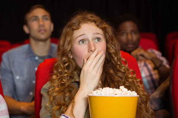 Young friends watching a film — Stock Photo, Image