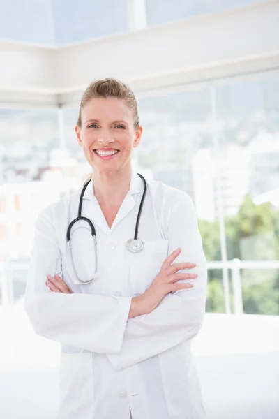 Smiling doctor looking at camera — Stock Photo, Image