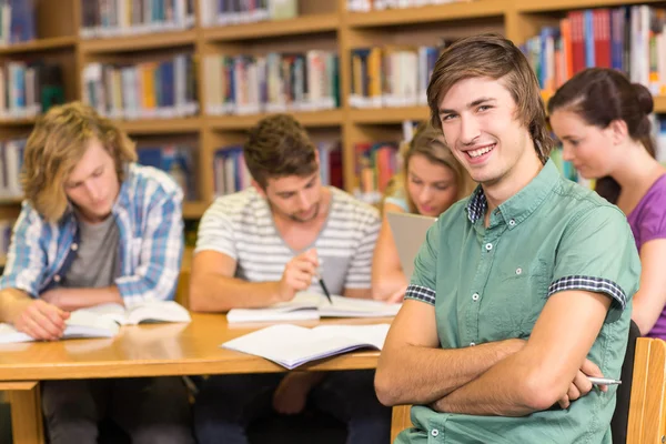 College students doing homework in library Stock Picture