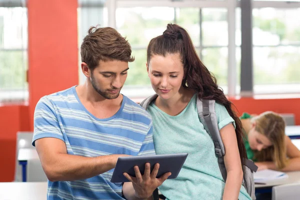 Students using digital tablet in classroom — Stock Photo, Image