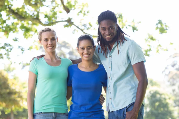 Happy friends in the park — Stock Photo, Image