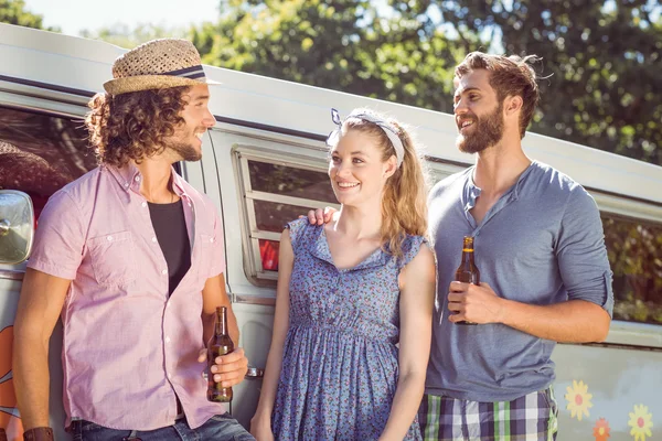 Hipster friends chatting and drinking — Stock Photo, Image